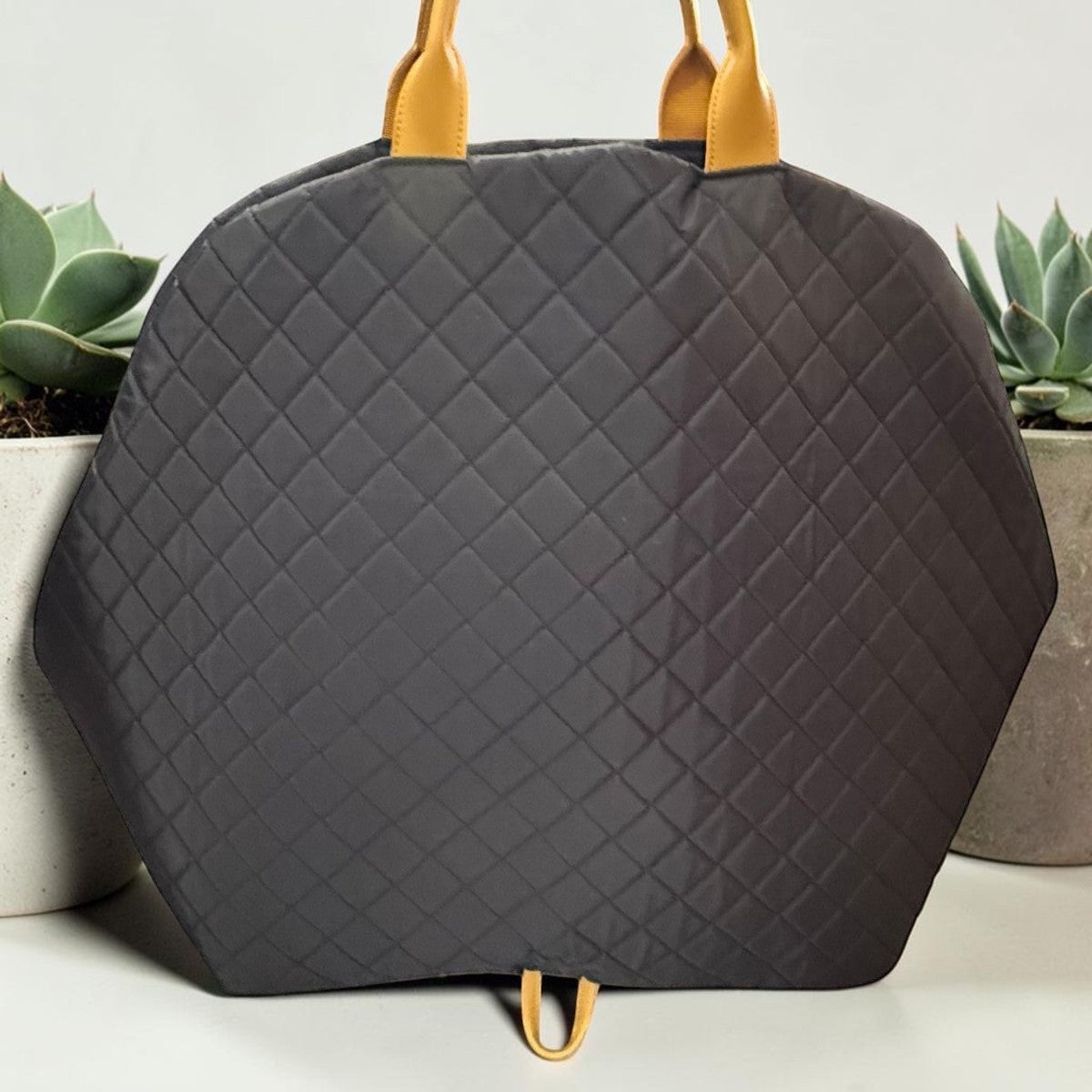 The Spoiled Pet Club black quilted nylon pet carrier bag with yellow handles for travel