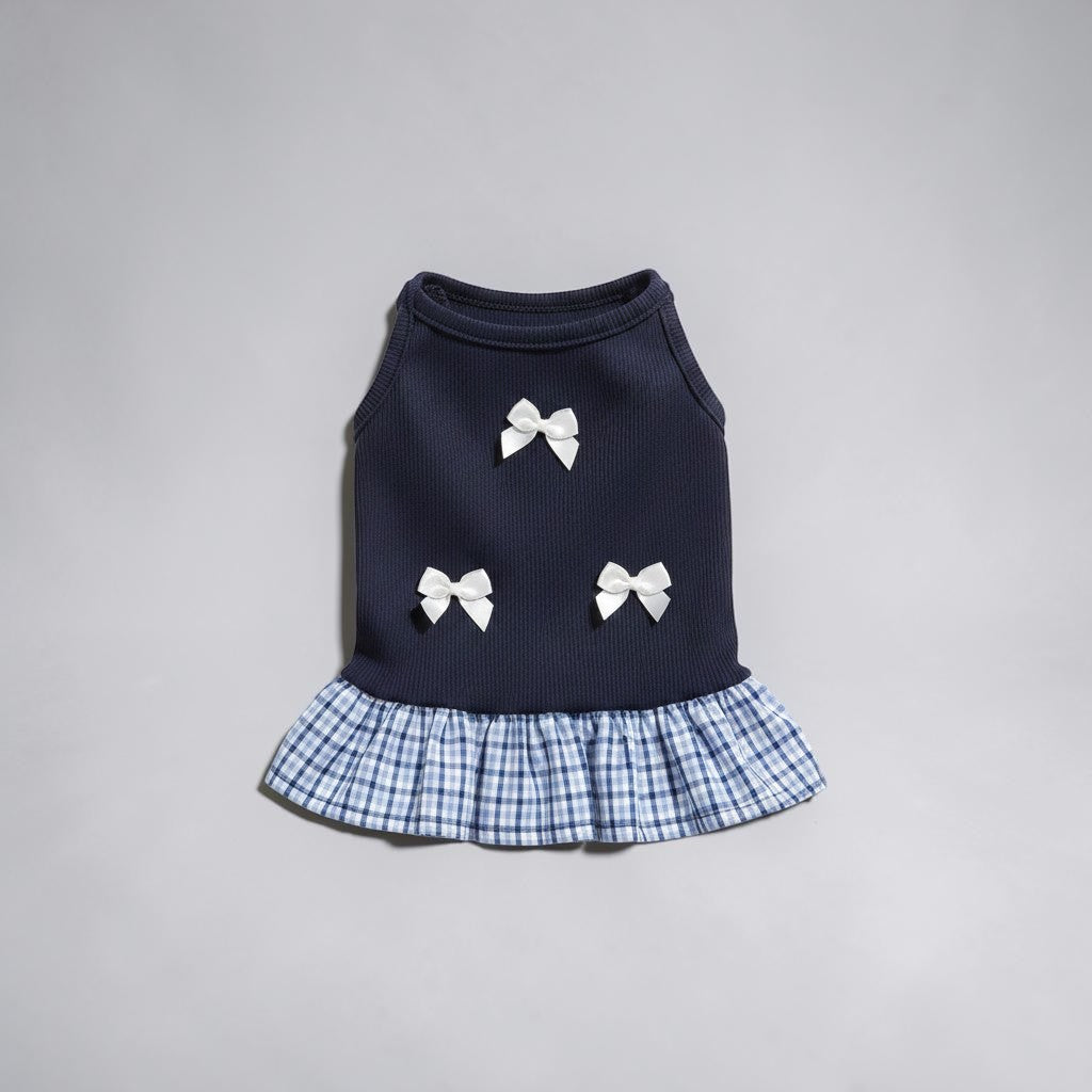The Spoiled Pet Club blue Camellia Bow Dress with white bows and a plaid ruffled skirt for small dogs