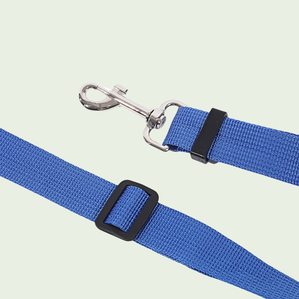 The Spoiled Pet Club blue nylon dog seat belt with a durable metal swivel clip and adjustable strap for car safety