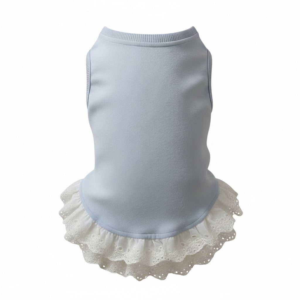 The Spoiled Pet Club blue polyester dog vest featuring elegant white lace trim at the hem for a stylish spring look.