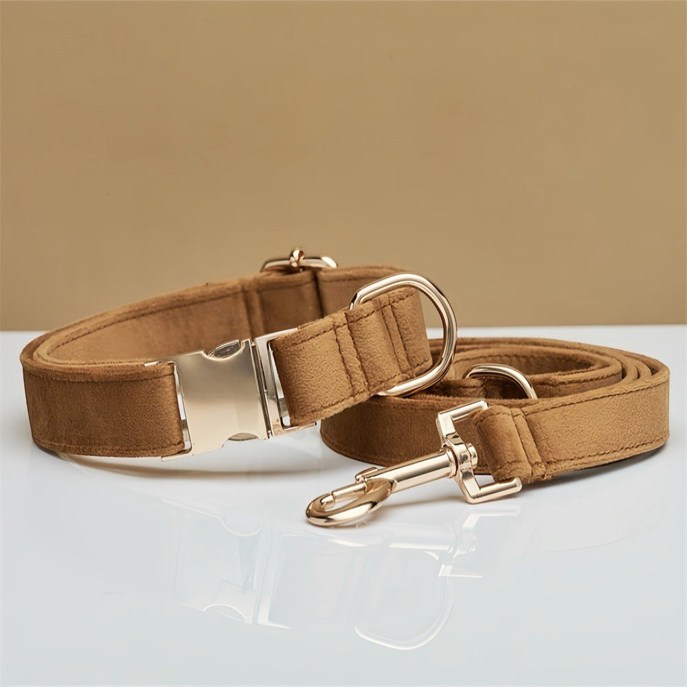 The Spoiled Pet Club brown velvet dog collar and leash set with gold-tone metal hardware on a white surface.