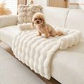 The Spoiled Pet Club Heavenly Paw Couch Nest, off-white plush dog bed with raised edges and a wavy texture, perfect for cozy naps.