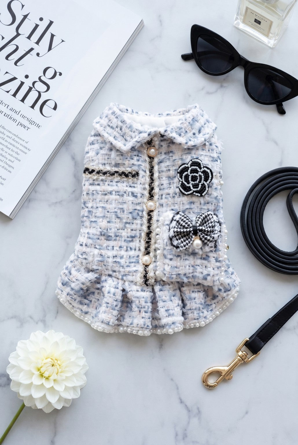 The Spoiled Pet Club Dahlia Darling tweed dog dress in light blue and white with pearl trim and floral embellishments.