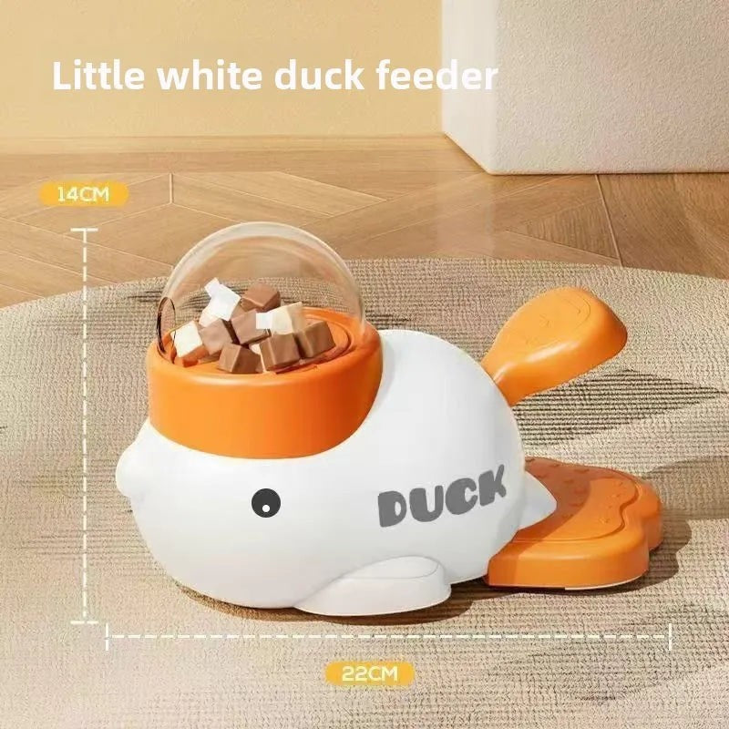 The Spoiled Pet Club Treat Me Duck treat dispenser is white and orange, with a clear lid filled with treats.