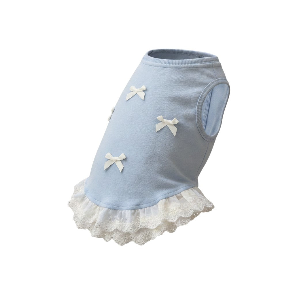 The Spoiled Pet Club blue dog pullover vest with white lace trim and small bow accents for a cute aesthetic.