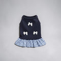 The Spoiled Pet Club navy blue pet dress with white bows and a plaid ruffled hem made of lightweight polyester