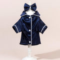 The Spoiled Pet Club navy blue satin pajama shirt with white piping and bow detail. Tailored silhouette.