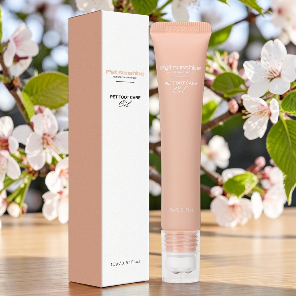 The Spoiled Pet Club Silken Step Paw Cream in a peach-colored tube and matching box for dog and cat paw care.