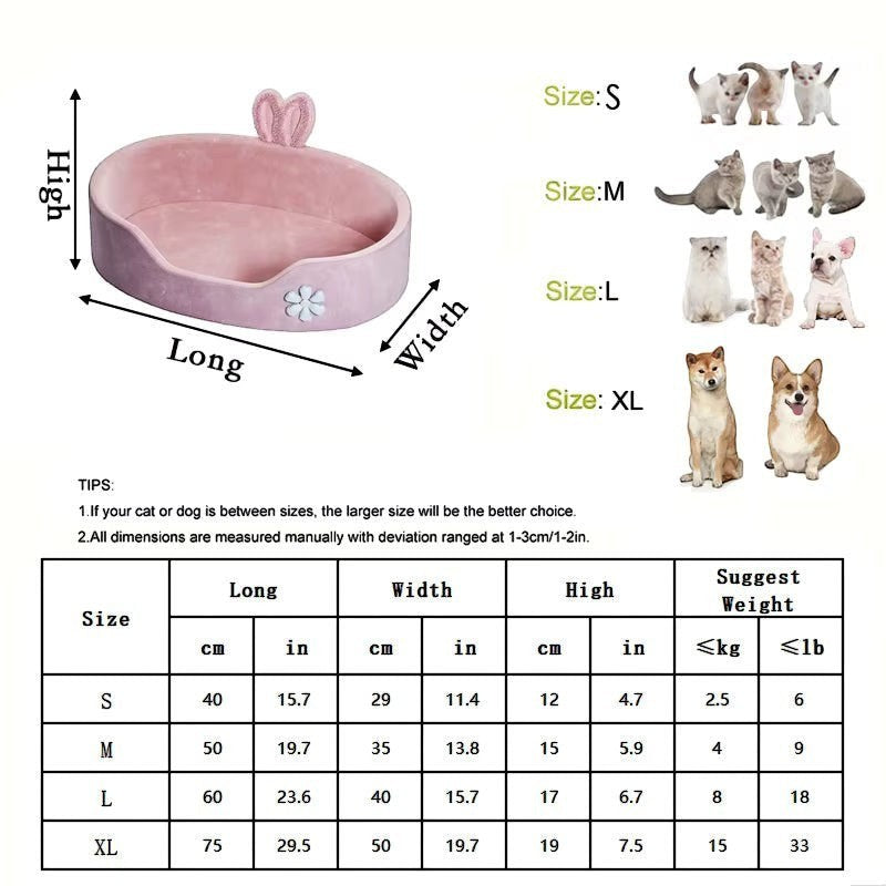 The Spoiled Pet Club pink plush pet bed with raised edges and bunny ears detail. Features a flower applique.