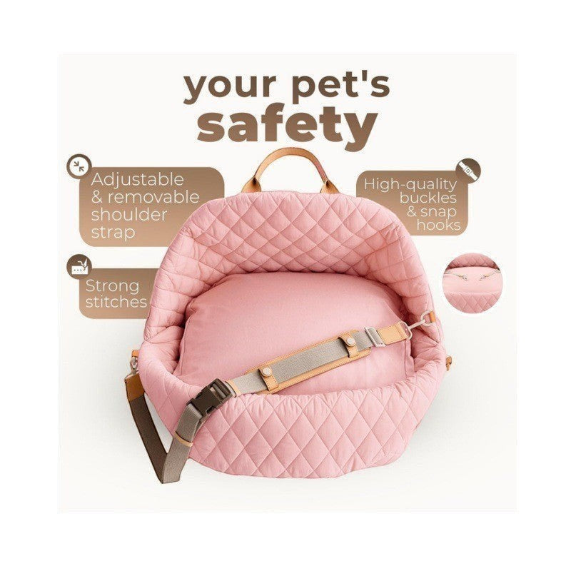 The Spoiled Pet Club pink quilted pet car seat with adjustable shoulder strap and secure safety buckles