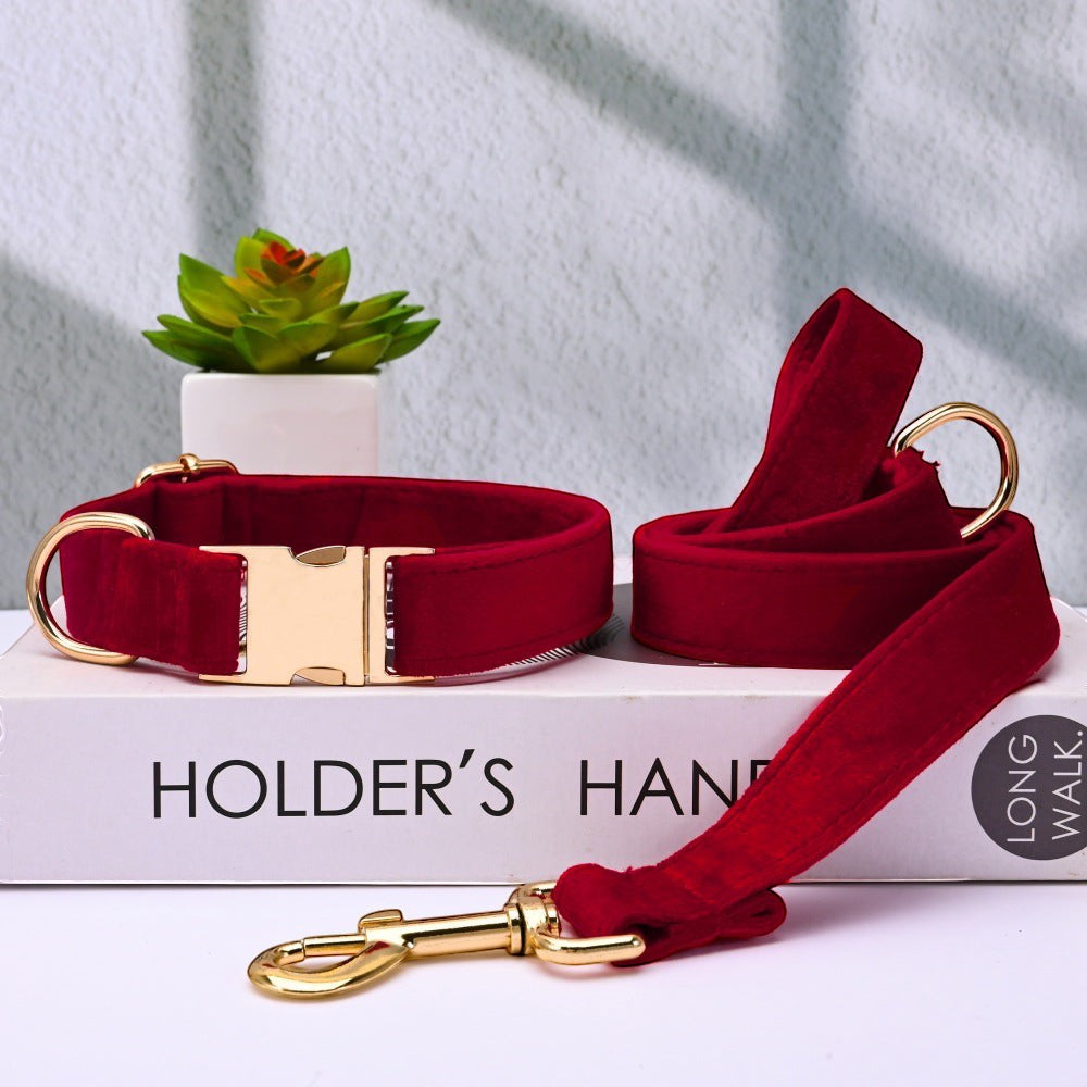The Spoiled Pet Club dark red velvet dog collar and leash set with gold hardware.