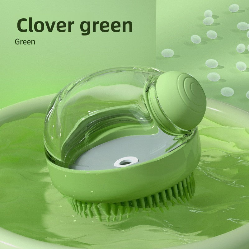 The Spoiled Pet Club Serene Suds Dispenser in clover green, a silicone grooming brush with a built-in soap dispenser for pet baths.
