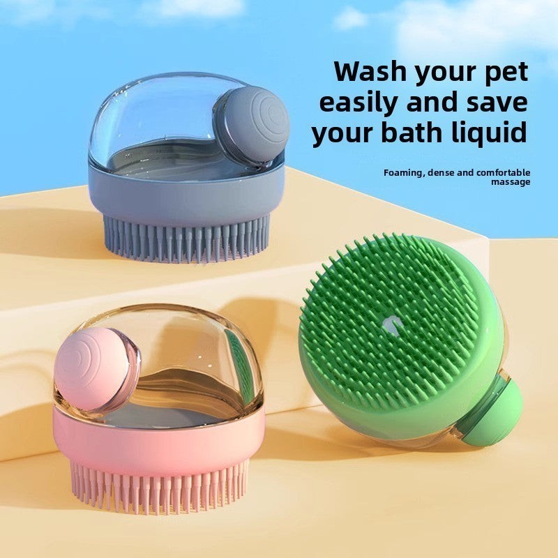 The Spoiled Pet Club Serene Suds Dispenser, a pet grooming brush with built-in soap dispenser in pink, blue, and green.