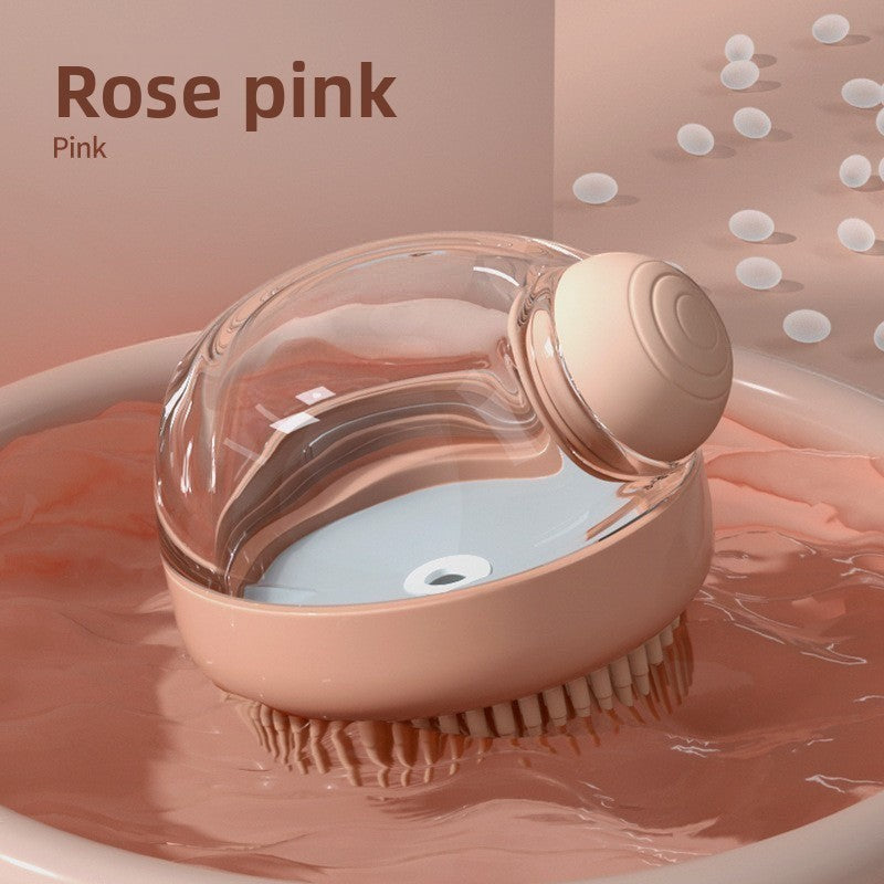 The Spoiled Pet Club Serene Suds Dispenser, a pink silicone and PP grooming brush with a built-in soap dispenser for dogs and cats.