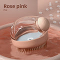 The Spoiled Pet Club Serene Suds Dispenser, a pink silicone and PP grooming brush with a built-in soap dispenser for dogs and cats.