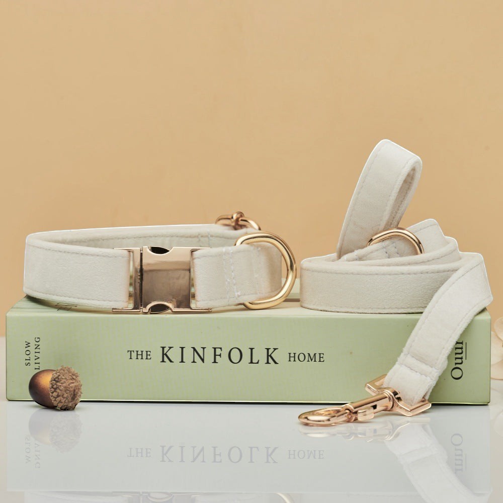The Spoiled Pet Club off-white velvet dog collar and leash set with gold hardware. Adjustable and comfortable for pets.