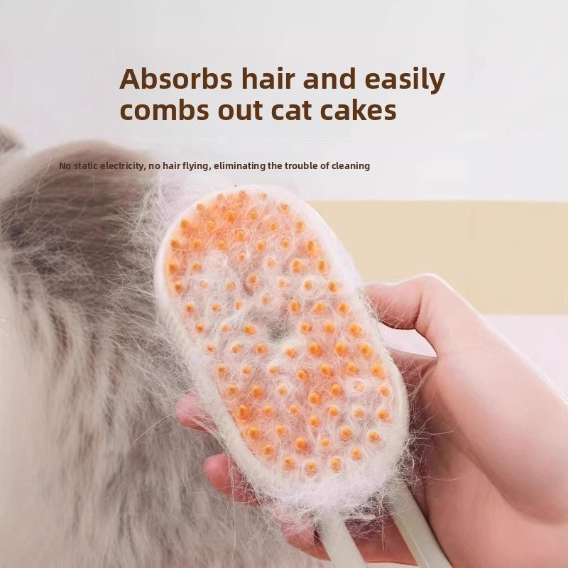 The Spoiled Pet Club Velvet Paw Spa Brush, white plastic grooming tool with orange silicone bristles for pet hair removal and massage.