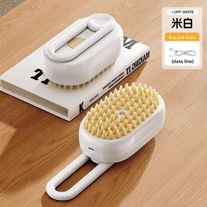 The Spoiled Pet Club Velvet Paw Spa Brush, white plastic pet grooming brush with soft silicone bristles and built-in soap mister