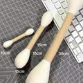 The Spoiled Pet Club Clubhouse cat toy in natural wool felt, shown in small, medium, and large sizes for play.